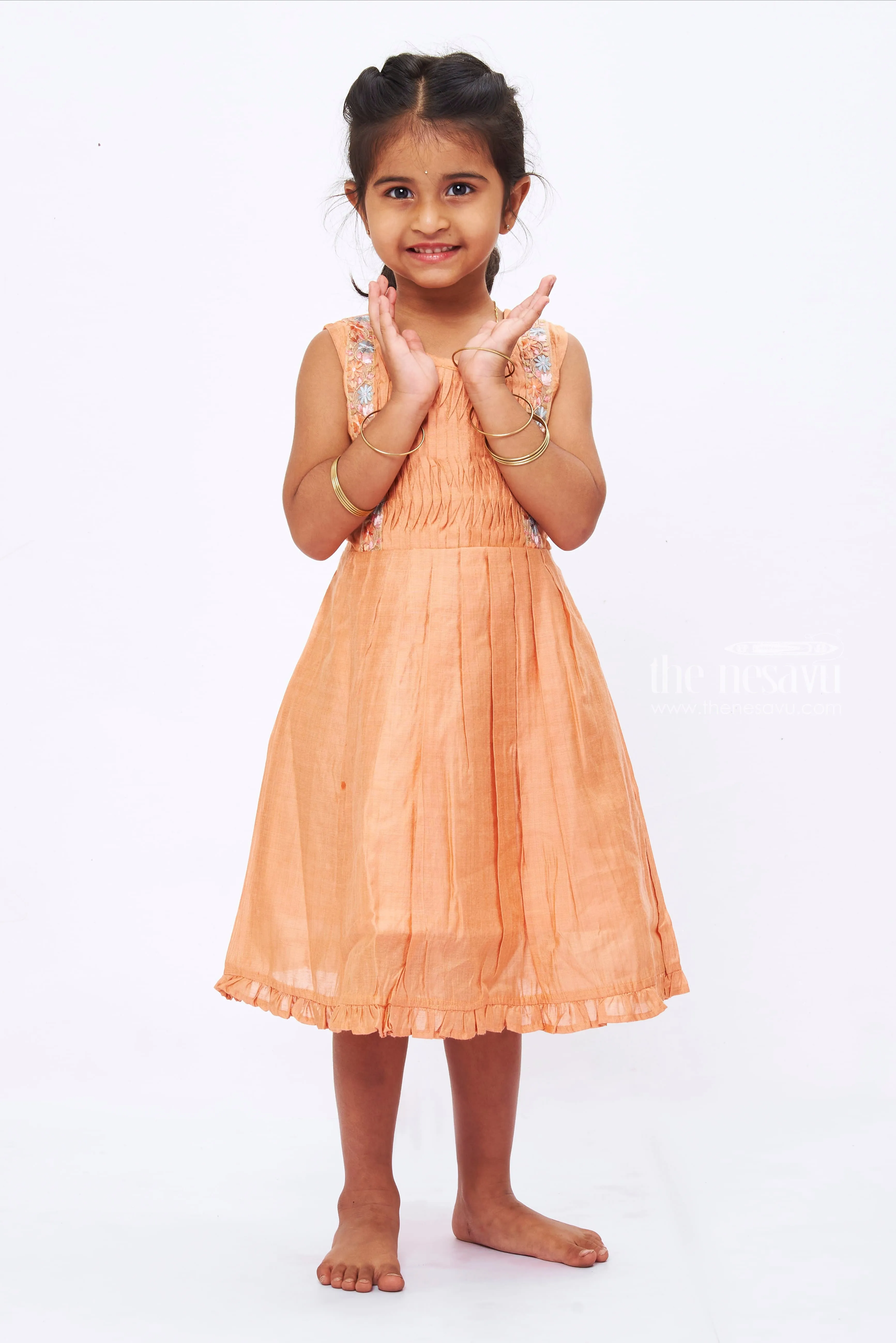 Vibrant Orange Pleated Frock with Delicate Lace Detail